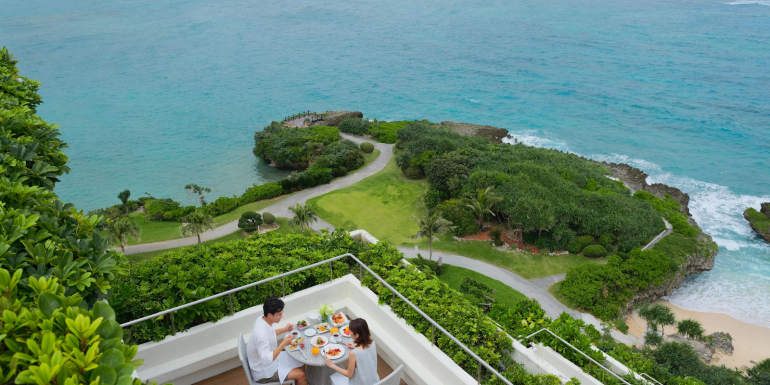 The Club Intercontinental Deluxe Corner Suite at the Intercontinental Manza Beach Resort in Okinawa, Japan offers a spacious outside terrace with 180-degrees of ocean views