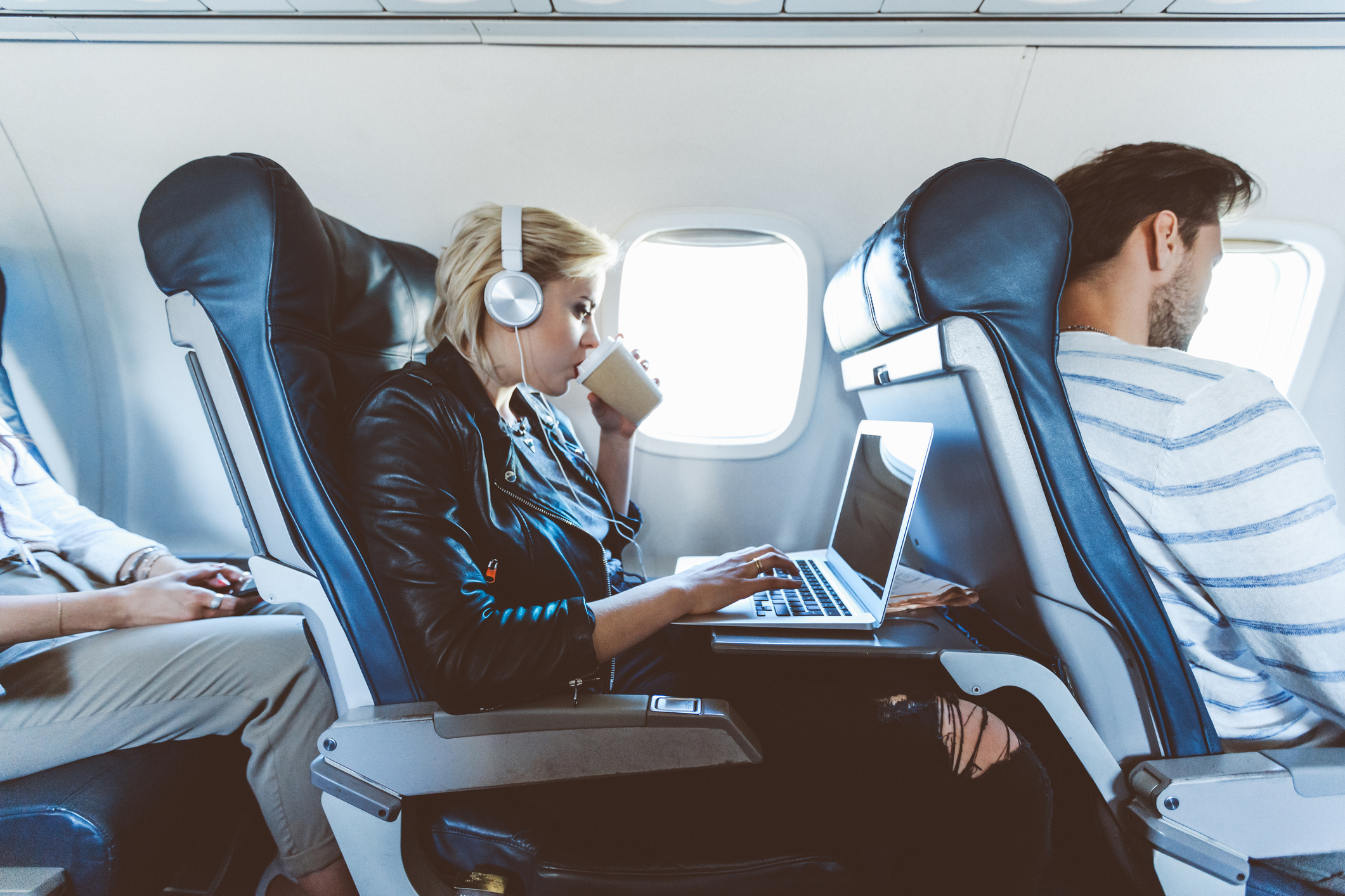 Flight Attendant Sitting In A Jump Seat With A Telephone High-Res Stock  Photo - Getty Images