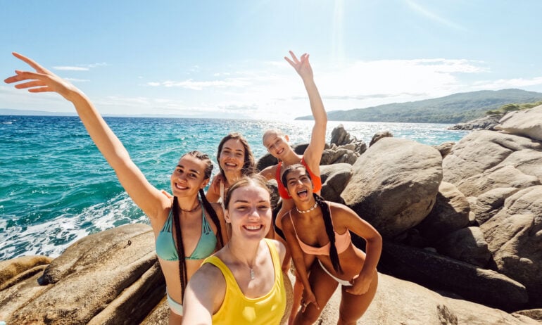 Head, Person, Face, women smiling on rocky beach/coast