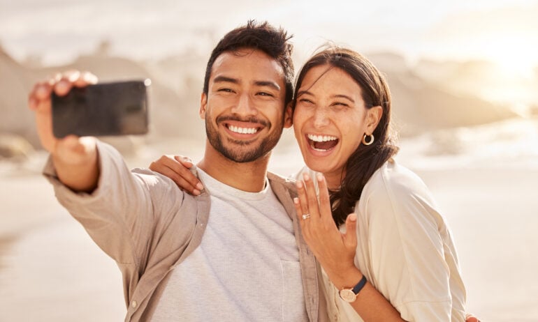 Engaged couple outdoors