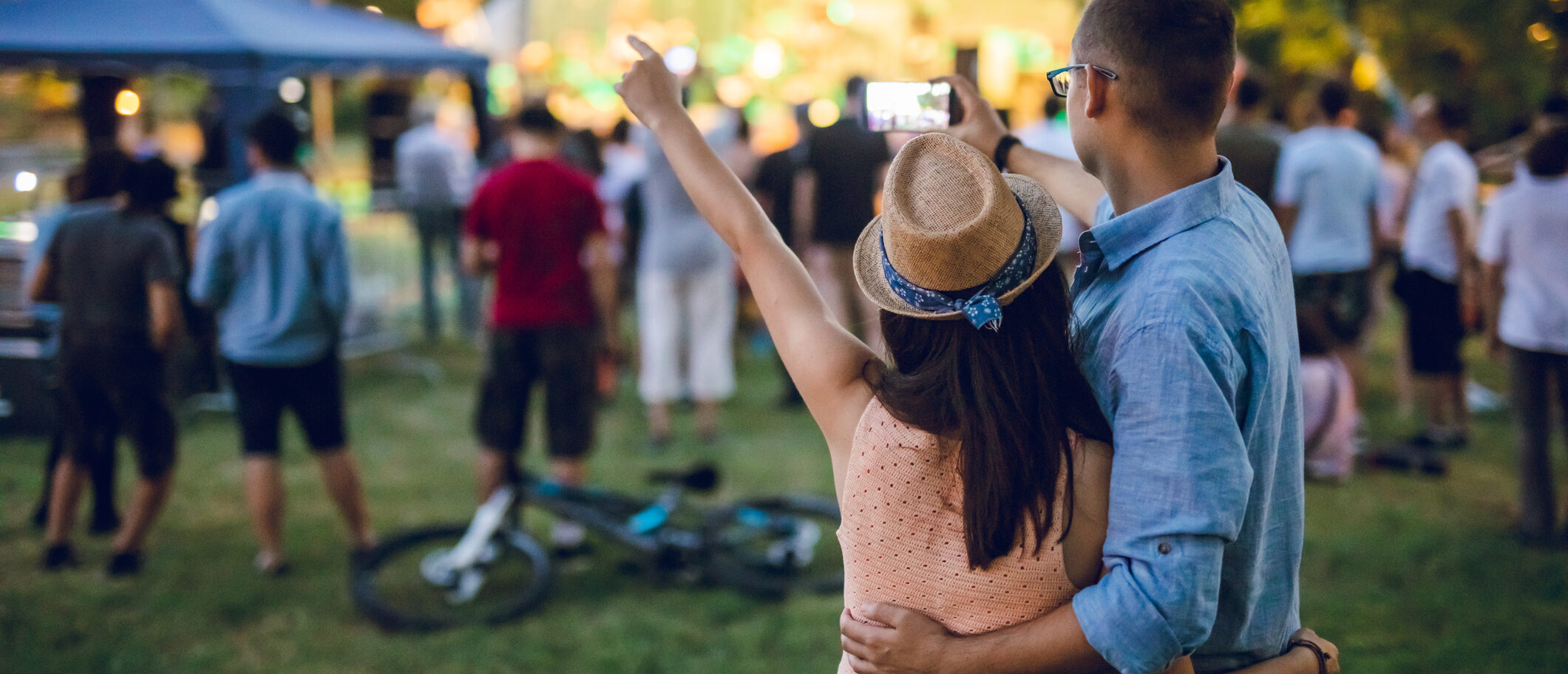 Young couple takes selfie at an American Express Front Of The Line event.