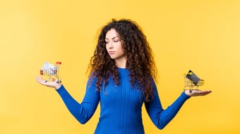 Woman considering her credit card choices.