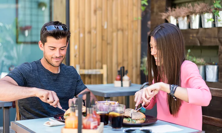 Couple dines at restaurant