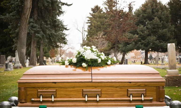 coffin at a cemetery