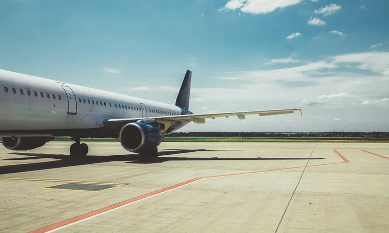 Airplane parked on the airfield