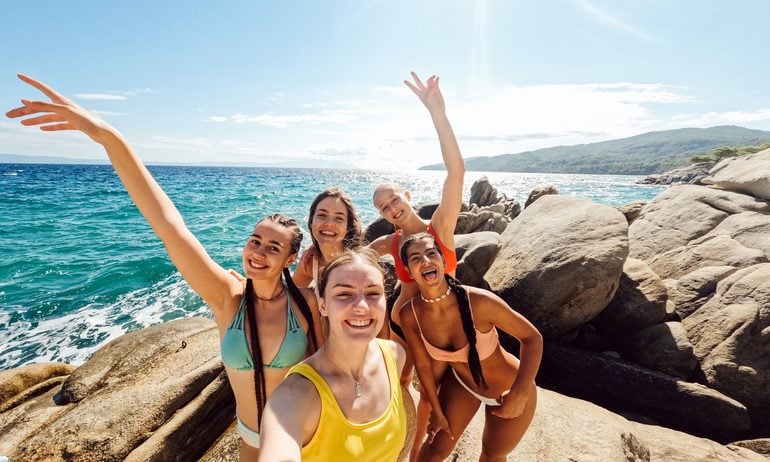 Head, Person, Face, women smiling on rocky beach/coast