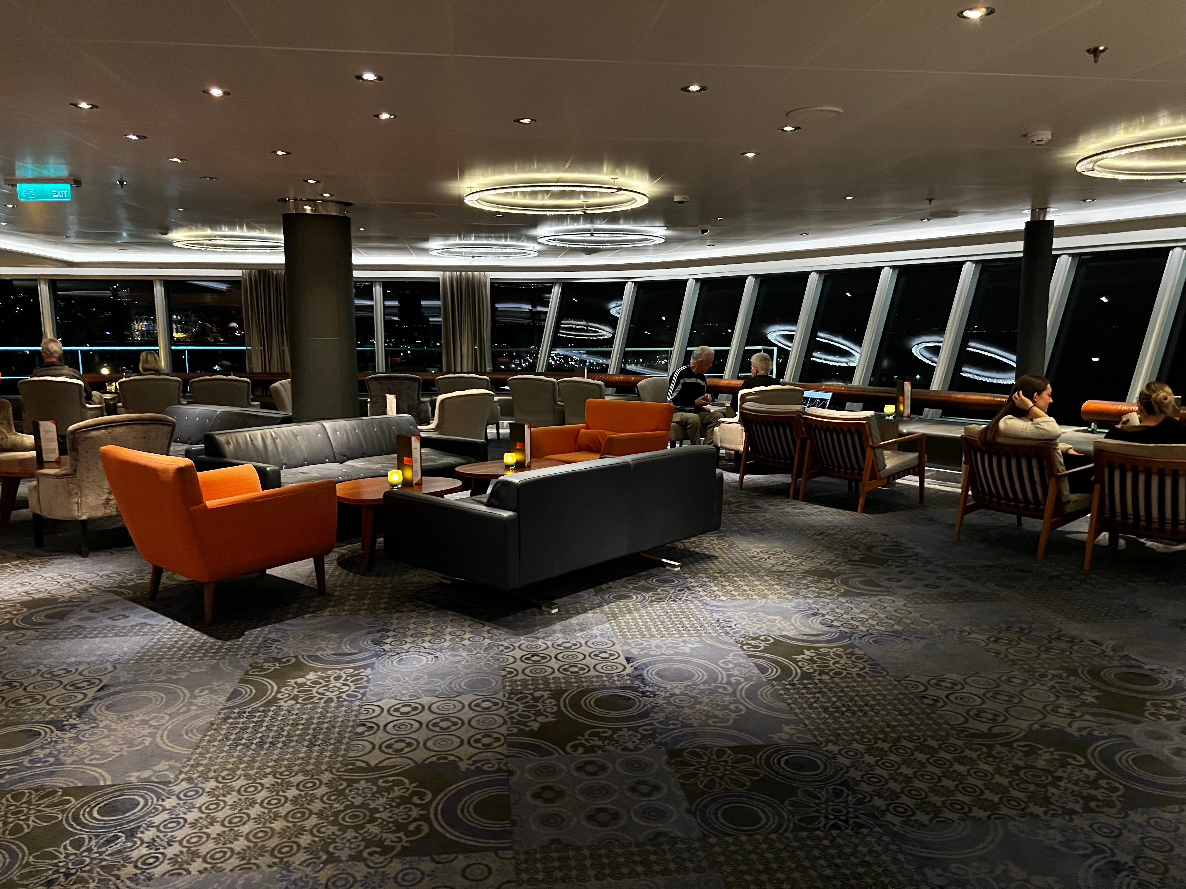 The panoramic view takes center stage in The Crow's Nest, a lounge on the top floor of most Holland America ships. (Photo by Sally French)